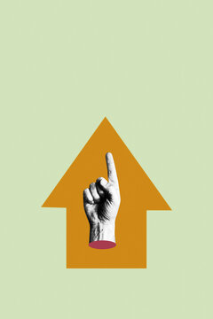 Hand pointing index finger upward on upward arrow background