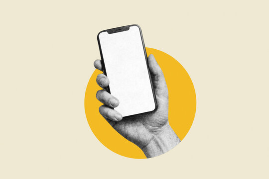 Hand holding smartphone with blank white screen on yellow circle background