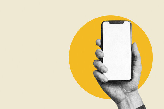 Hand holding modern smartphone with blank white screen on yellow circle
