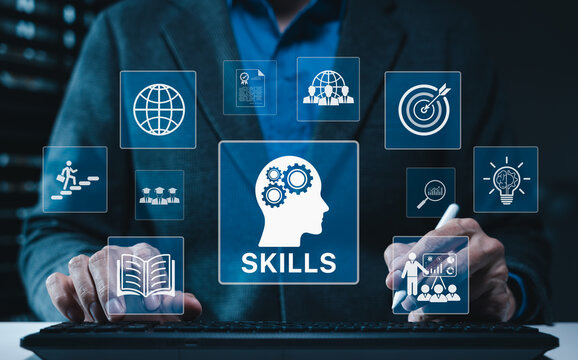 Skills Development and Learning. Personal growth concept. Businessman typing keyboard with icons representing skills, education, learning, personal development, professional growth through technology