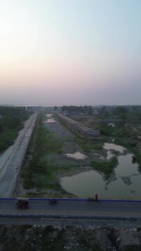 Aerial View of a Bridge Over a Riverbed