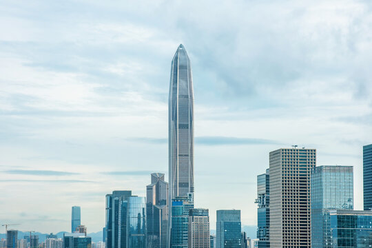 Glass skyscraper and modern high-rise buildings in Futian District, Shenzhen city, China. Contemporary architecture, financial district, corporate economy, travel and tourism in Asia