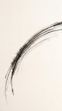 Abstract ink brush stroke forming a graceful arc on textured white paper background.
