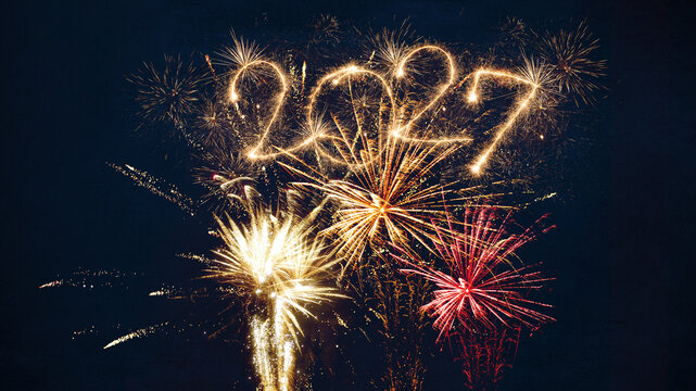 happy new year, new year's eve, silvester, new years eve, sparklers celebration greeting card, new year card - Year 2027 in sparkler font and firework fireworks pyrotechnic, dark night sky background