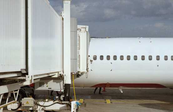 Passenger Jet at a Boarding Bridge