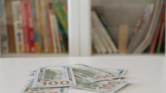 Blurred Shooting with a Man Counting Cash Money, Calculating Salary Payments, and Paying in Cash. Financial Investments Concept.