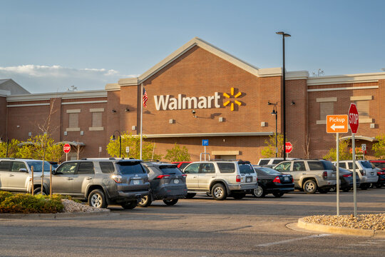 Fort Collins, CO, USA - April 26, 2023: Parking lot at Walmart, American multinational retail corporation that operates a chain of hypermarkets, discount department stores, and grocery stores.