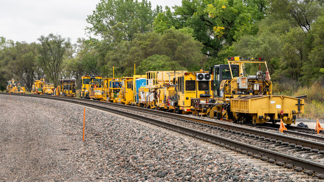 Dunning, NE, USA - September 10, 2023: BNSF (Burlington Northern Santa Fe) railway siding with track maintenance vehicles and machinery.