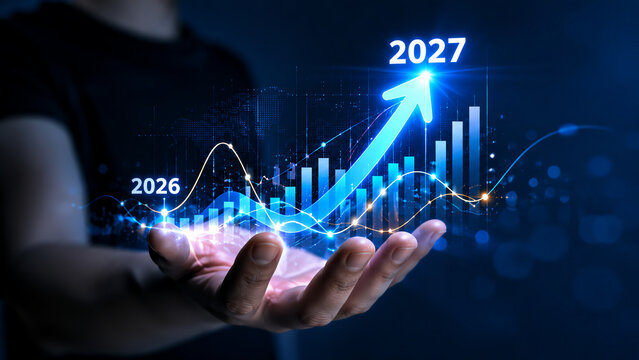Person holding glowing financial growth chart with blue upward arrow from year 2026 to 2027 in futuristic technology interface