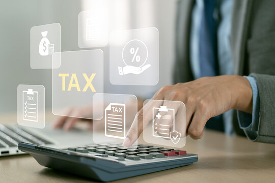 Tax deduction planning concept. Business person using a laptop to complete income tax return form online.Calculation tax return concept.