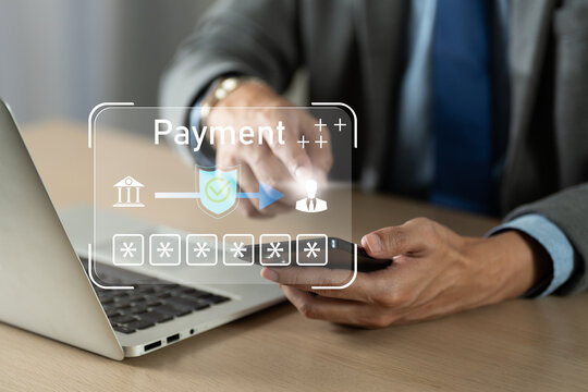 Secure online payment concept, businessman uses smartphone and laptop for digital transaction with banking security interface, payment, security, banking, transaction, fintech