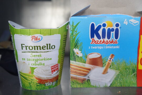 Branded Polish dairy snacks in opened Pilos Fromello and Kiri Przekaska packages