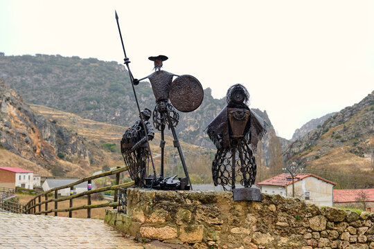 Don Quixote and Sancho Panza metal sculptures in Pancorbo, iconic literary characters and Spanish cultural heritage in a rural landscape of Spain