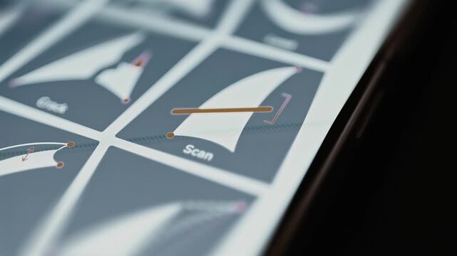 Orange scan bar sweeps across a curved specimen
