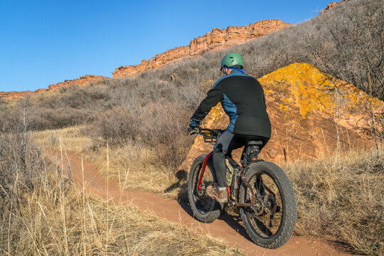 cyclist on a fat mountain bikes riding Blue Sky Trail near Fort Collins, Colorado, fall scenery