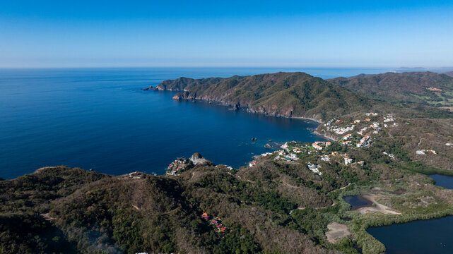 Panoramic Drone View of Pacific Ocean and Mountainous Coast in Colima Mexico