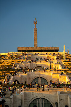 Beautiful view of the Yerevan Cascade Complex full of people on Yerevan City Day at Sunset.