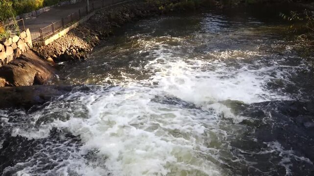 Nykoping, Sweden The Storhusfallet Qvarnen waterfall i the town centre. 

