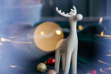 Ceramic reindeer with festive lights. © Rawpixel.com