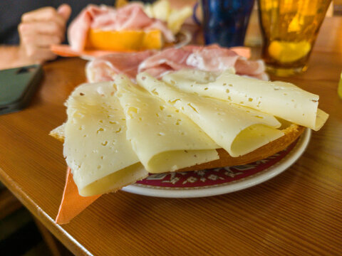 Cortina d&rsquo;Ampezzo, Italy. Italian Bread Sandwich with Sliced Cheese and Ham in a Caf&eacute;