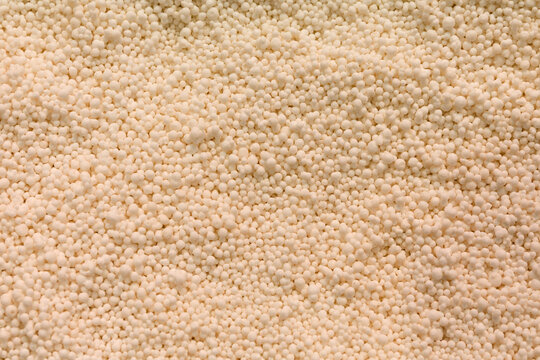Plastic Granules Thermoplastic Polymer Material in Bulk Background Texture