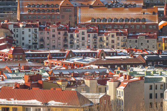 Layered urban rooftops showing classic Nordic residential blocks.