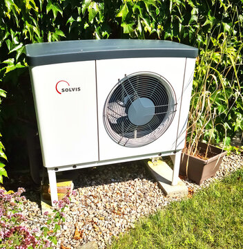 Kiel, Germany - 08 August 2024: A Solvis heat pump in front of a house.