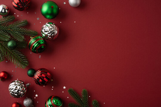 Merry Christmas holiday background with red and green baubles and Happy New Year greeting