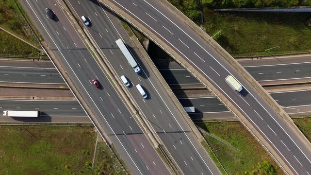Aerial View of Busy Motorway Interchange with Heavy Traffic Near Crick UK