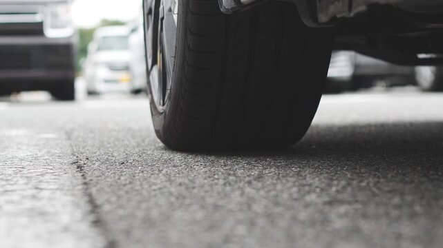 Close Up of Car Tire on Road Surface
