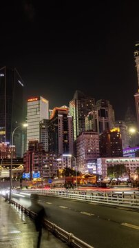 Chongqing cyberpunk city skyline on the Qiansimen Bridge in vertical