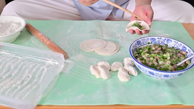 Making Handmade Dumplings with Pork and Chive Filling