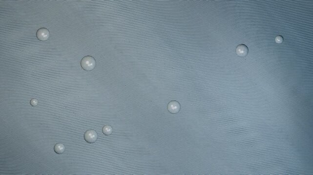 Precision aluminum moire with anisotropic engraved ribs seamless loop