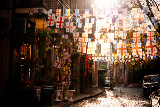 Flags of Georgia and EU seen in the streets of old town Sololaki in Tbilisi, Georgia.