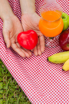 Vertical Picnic basket food bread fresh fruit coffee cup orange juice wood wicker box. Vertical Wheat bakery fruit food drinks green park outdoor lifestyle. Healthy appetizer box outdoors garden