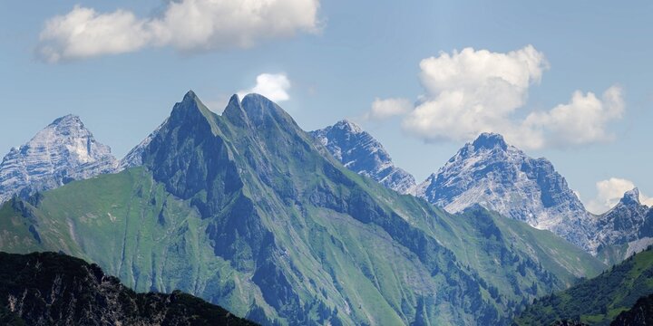Summer in the Alps, mountain panorama from Fellhorn 2037 m, of the green grassy H&ouml;fats, 2259 m, Hochvogel in the back left, 2592 m, and on the right Kleiner Wilder, 2306 m, Allg&auml;u Alps, Bavaria, Germany