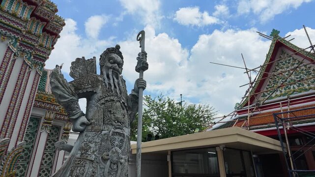 Chinese Stone Guardian Warrior Statue at Wat Pho Temple in Bangkok