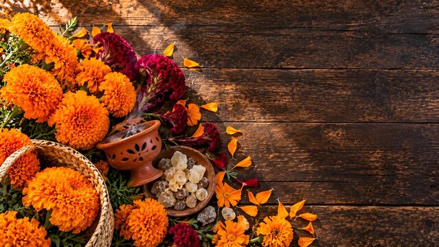Traditional Day of the Dead Altar with Marigolds and Copal Incense on Rustic Wood