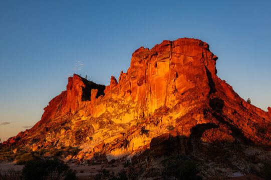 Landscape with Red rocky outcrop at Sunset