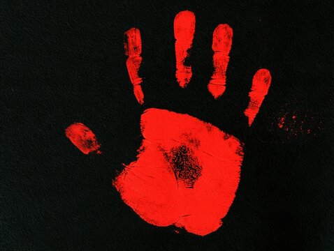 Red handprint with blood-like stain on dark background Vector