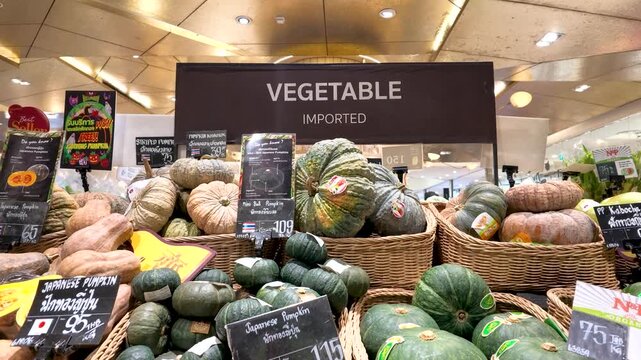 Fresh Japanese Squash and Pumpkins Displayed in Grocery Store
