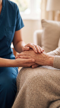 Healthcare Worker Holding Elderly Patient Hands with Compassion