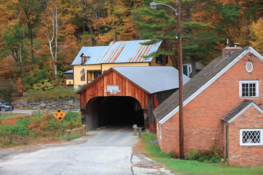 Historic Mill Bridge in Tunbridge, Vermont, amid autumn foliage