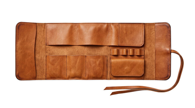 Vintage brown leather tool roll organizer, handcrafted tan leather pouch for pens and brushes, rustic artist storage wrap with pockets isolated PNG with Transparent Background