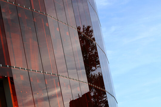 modern building with orange glass facade