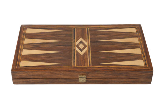 Closed antique wooden backgammon board with intricate light and dark wood inlay patterns, isolated on a clean white background