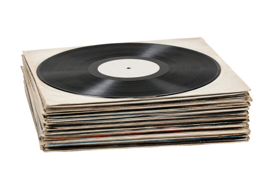 Stack of old vinyl records with a blank label record on top, isolated on a white background