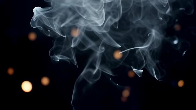 White smoke curls and drifts through dark space as glowing orange particles float behind, creating an abstract atmospheric motion background with fluid wisps and soft contrast