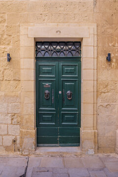 Classic Maltese Green Wooden Entrance Door with Brass Head Knockers, Mdina, Malta