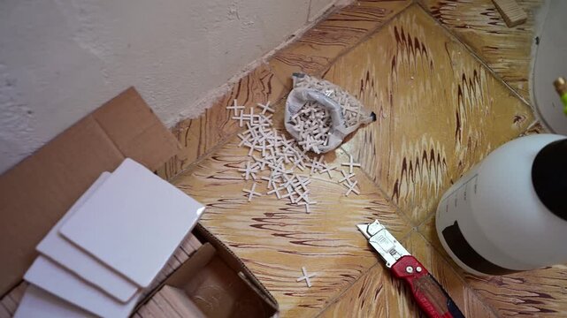 Floor tiling preparation with tools and materials